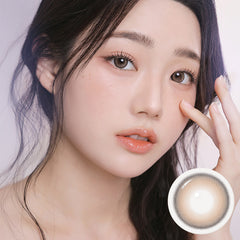 I-SHA Oriana Mune Brown 1Day contact lenses in a brown color with clear packaging and branding.