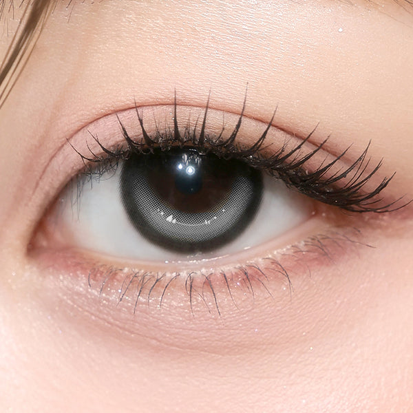 Gray eye contact lens from Wish I-GIRL's One Pick Dear One Dear collection, showcasing realistic eye detail.