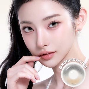 Model wearing I-SHA REBORN Hue Peanut Latte Korean monthly colored contact lens
